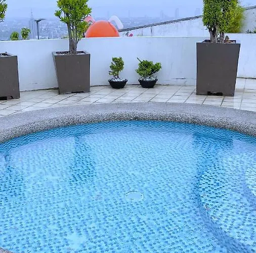 Along Tomas Morato W/ Wifi Smarttv & Karaoke Apartment *